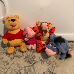 Winnie the Pooh stuffed animals, piglet, tigger, Eeyore